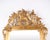 Large antique french wall mirror in louis xv rococo style from the 19th century. The mirror features a richly decorated...