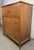 Classic mid-century modern highboy dresser by the renowned Broyhill Premier Division, showcasing the clean lines and...