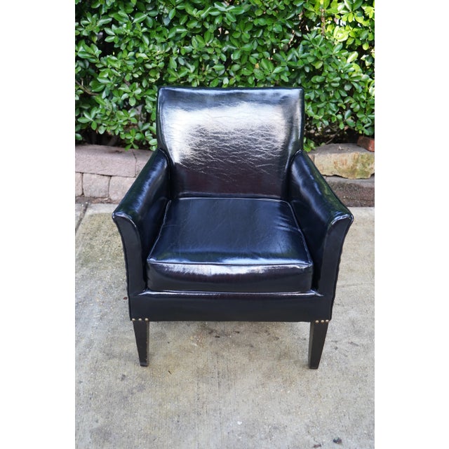 Vintage black patent leather armchair with grommets detail, gives off a restrained glam rock vibe. Photos do not do it...