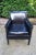 Vintage black patent leather armchair with grommets detail, gives off a restrained glam rock vibe. Photos do not do it...