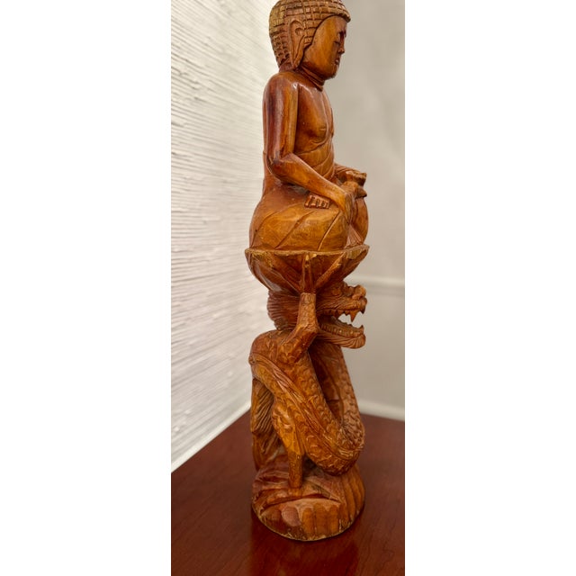 ONE OF A KIND ANTIQUE! This intricately carved exquisite statue stands at an impressive two feet tall. A real statement...