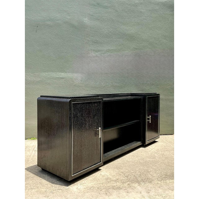 This sophisticated vintage entertainment credenza by Ralph Lauren exemplifies the brand’s refined approach to modern...