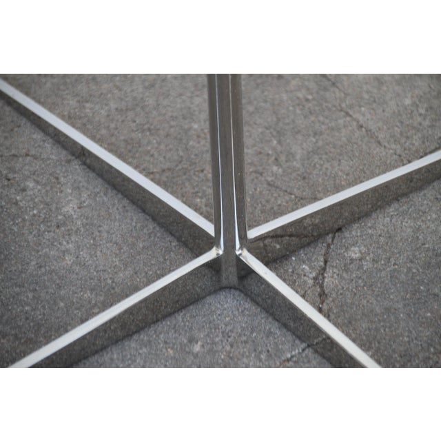 This is a nice pair of Marc Thorpe side tables. These tables have a pedestal chrome base and curly maple tops. Dimensions:...