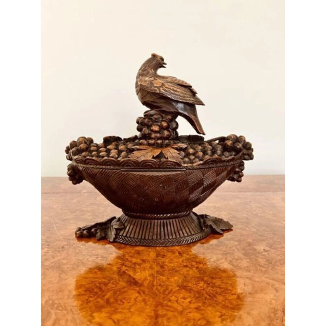 Outstanding quality carved Black Forest jewellery box having a quality carved eagle to the top above carved leaves and...
