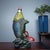 This is a charming vintage Chinese snuff bottle, crafted from Liuli (traditional Chinese glass) in the sculptural form of...