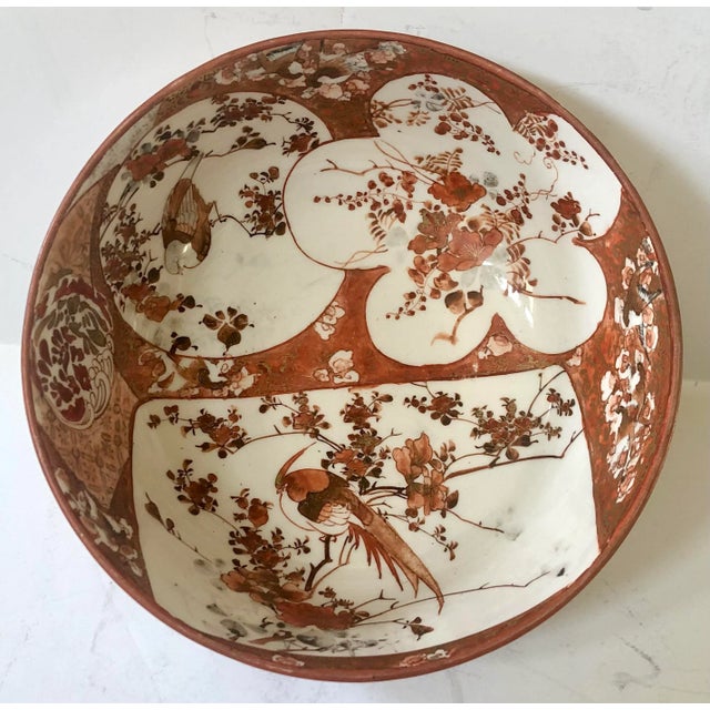 Possibly late 19th century, this lovely Japanese bowl is in the Kutani style and has minor wear on the top rim. Artist’s...