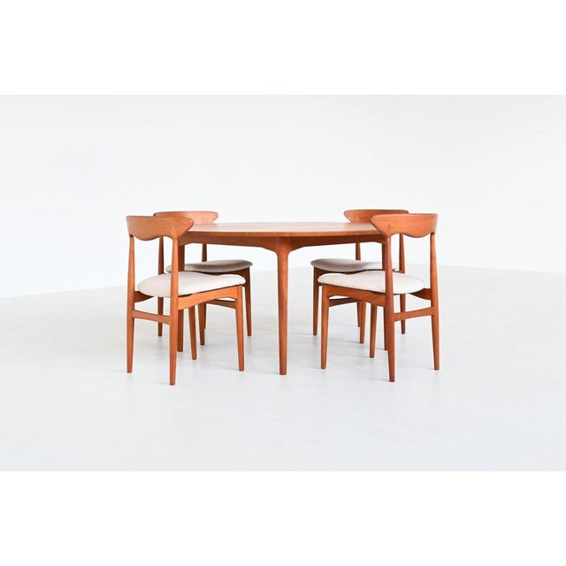 Exceptional round dining table was designed and produced by france & son for cado, denmark, 1960. A fine example of danish...