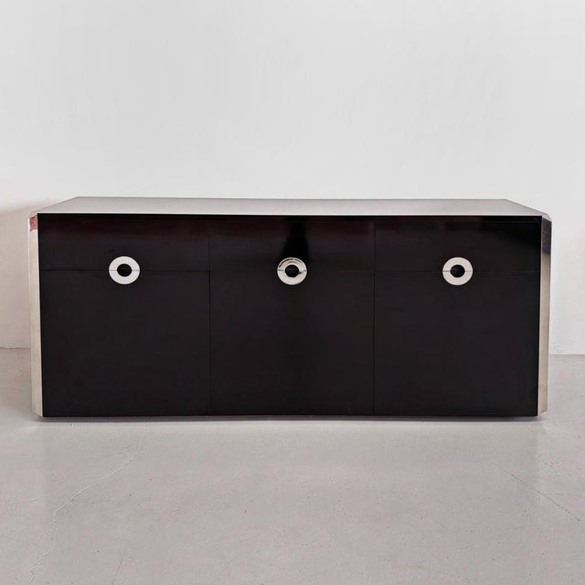 Bar Sideboard in Black Laminate and Chrome by Mario Sabot, 1970s, in Very Good conditions. Designed 1970 to 1979 This...