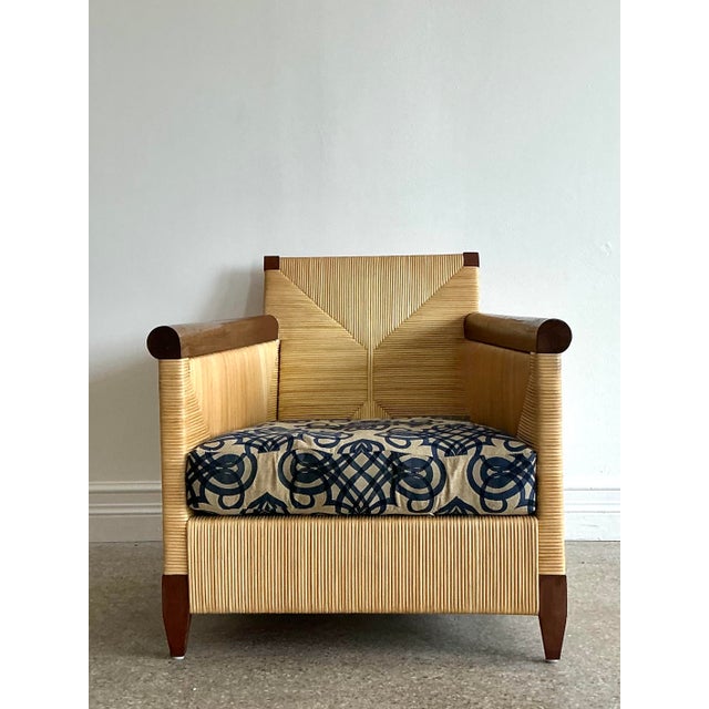 Exude effortless coastal sophistication with this exceptional "Merbau" lounge chair by the esteemed design house Donghia....