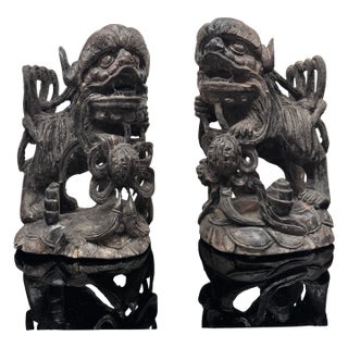 Mid 20th Century Pair of Intricately Carved Wooden Foo Dogs For Sale