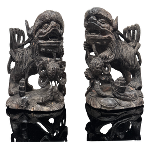 Mid 20th Century Pair of Intricately Carved Wooden Foo Dogs
