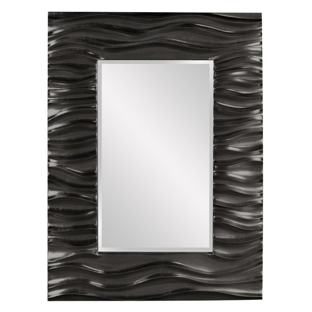 Our Zenith Mirror features a rectangular frame that is characterized by a deep textured wave design. The waves give an...