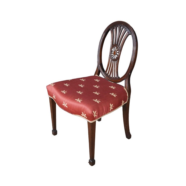 This antique 19th Century Hepplewhite mahogany side chair beautifully exemplifies the refined symmetry and neoclassical...
