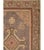 This Early 20th century East Turkestan Khotan rug, measuring 1' 4" x 2' 2", exemplifies the distinctive artistic...