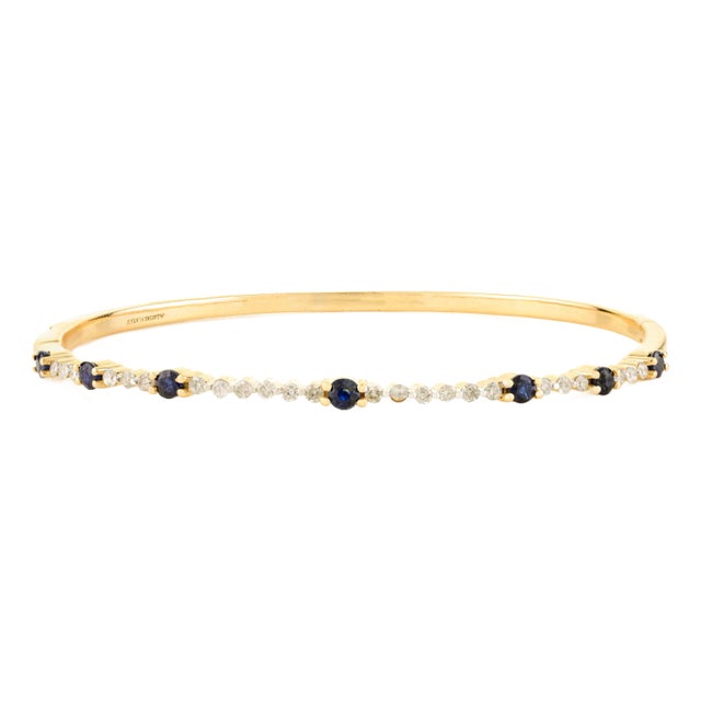 Contemporary Style Deep Blue Sapphire Bangle Bracelet With Diamonds For Sale