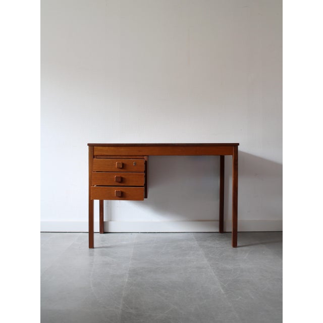 Vintage Danish Desk in Teak attributed to Domino Møbler, 1960s, in Good conditions. Designed 1960 to 1969 This piece is...