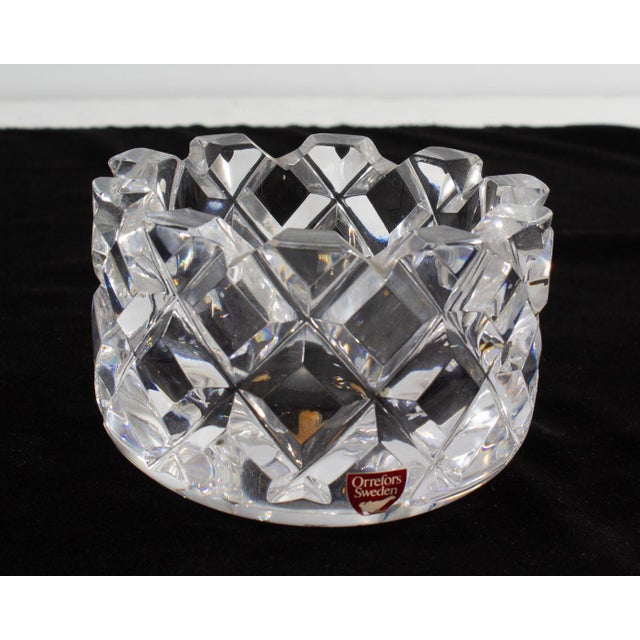 A diamond cut small bowl designed by Swedish designer Gunnar Cyren (1931-2013) for Orrefors. Made in Sweden, this clear...