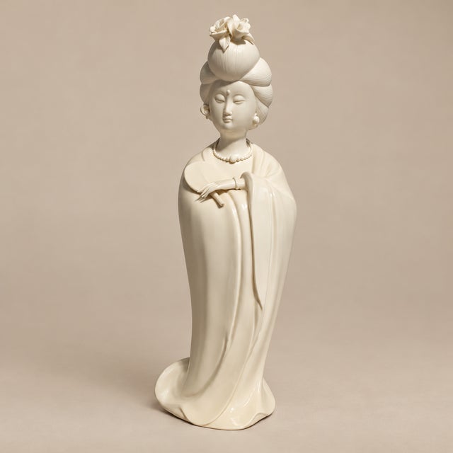 An elegant and beautifully sculptural Mid-Century geisha figure with a striking combination of glossy glazed ceramic and...
