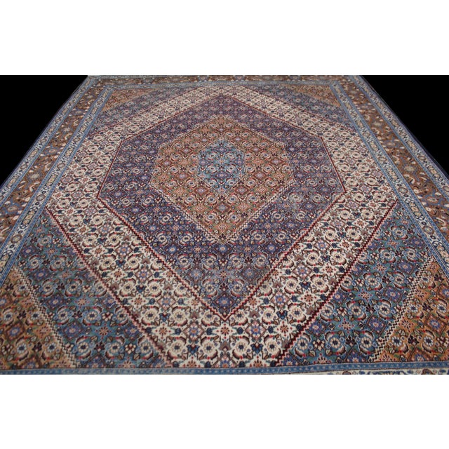 This rug is of a Doroksh design and features lovely colors that will last a lifetime. Made in the 1940's, this rug's...