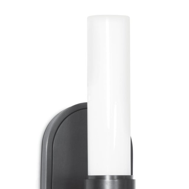 With its sleek and streamlined design, this wall sconce is perfect for any space in need of a modern touch. The Dixon...