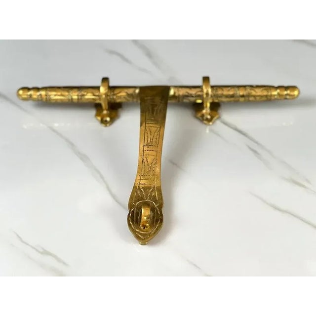 Introducing our Exquisite Handmade Moroccan Door Latch with Engravings Experience the allure of Moroccan craftsmanship...