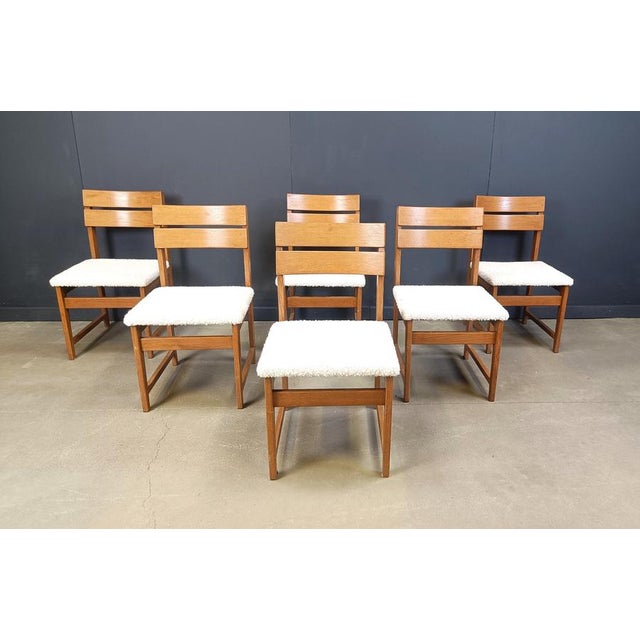 Mid century brutalist dining chairs with newly upholstered comfy white bouclé fabric. Very sturdy chairs with a nice...