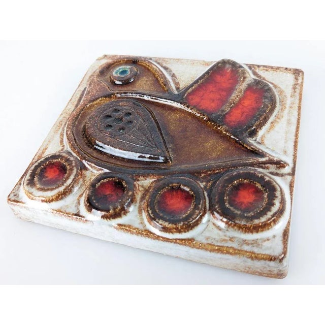 Fantastic relief plaque made in glazed stoneware by Danish artist Noomi Backhausen for Søholm in the 1960s, numbered and...