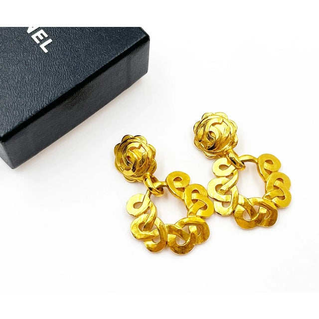 Chanel Vintage Gold Plated CC Flower Twisted Round Clip on Earrings * Marked 97 * Made in France * Comes with the original...