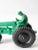 This is a vintage Auburn Rubber Company toy tractor. Dating to the 1950s, the green hard rubber toy tractor features "All...
