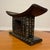 A hand-carved African stool in the Ashanti (Asante) tradition, crafted from solid wood with a deep espresso finish. This...