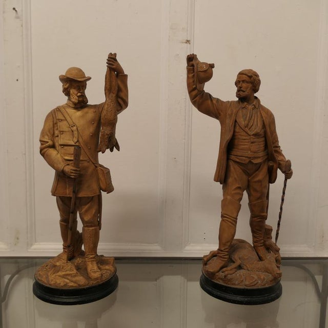 Pair of Black Forest Huntsmen, Pottery Figures A very handsome pair of 19th Century Figures, 2 huntsmen with their quarry,...