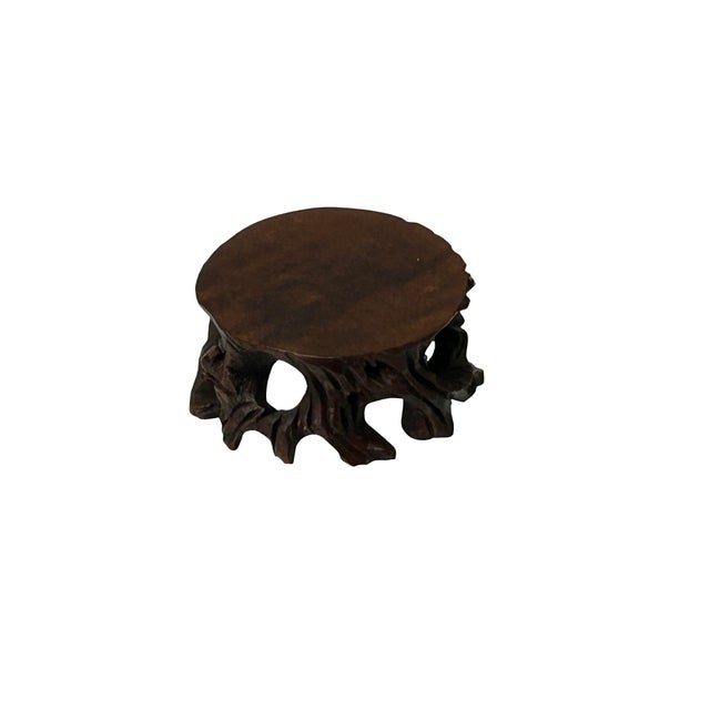 This is a handmade Chinese accent decorative display stand made of dark brown stained wood with irregular stem-like...