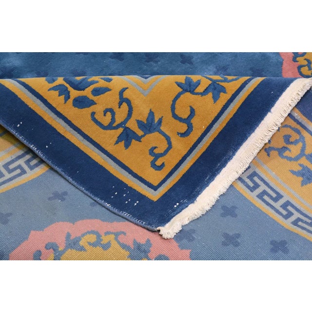 Hand-knotted with care using traditional rug-making techniques, this wool rug blends timeless craftsmanship with a modern...