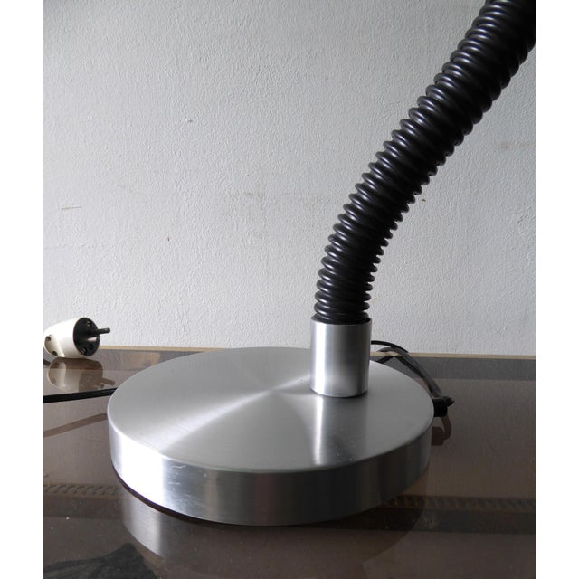 Serpent Table Lamp by Martine Le Forestier for Raak, 1960s, in Very Good conditions. Designed 1960 to 1969 This piece has...