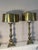 50” Large impressive palatial antique brass lamps in Batoque style with brass shades.