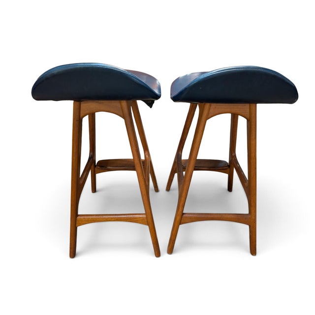 Pair of Erik Buch barstools in navy blue.