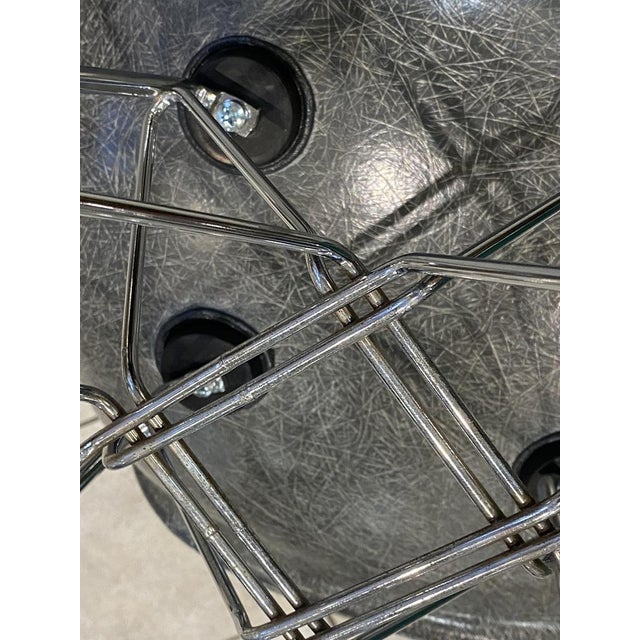 DSR "Dining Side Chair Rod" Designed by Charles & Ray Eames Manufactured by Herman Miller Color: Elephant Grey This chair...