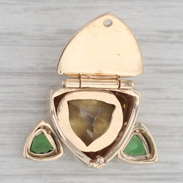 Gemstone Information: - Natural Zircon - Carats - 3.60ct Cut - Trillion Brilliant Color - Yellow / Orange Treatment -...