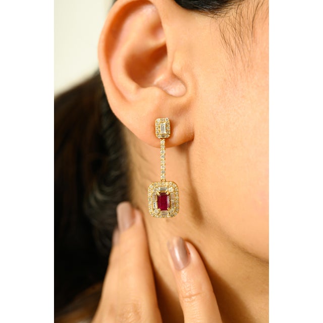 Crafted in radiant 14K yellow gold, these exquisite drop earrings showcase timeless elegance with a modern twist. Each...