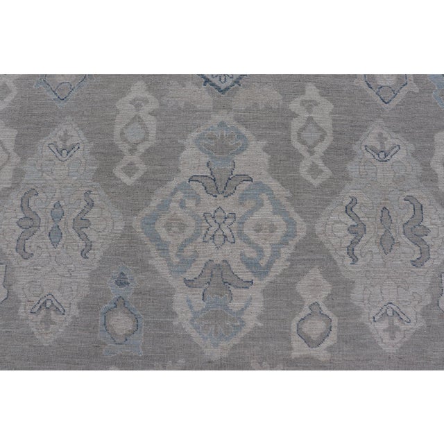 Early 21st Century Turkish Oushak Rug With Soft Gray Field and Pale Blue Geometric Motifs For Sale - Image 5 of 16