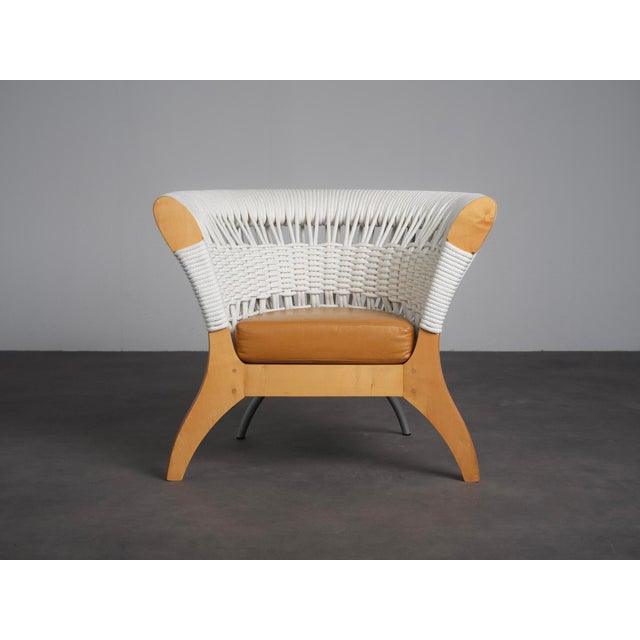 A striking and highly sculptural lounge chair produced by driade in italy in 1996. The design combines a beautifully...