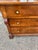 A fine French Louis Philippe walnut commode featuring three spacious drawers with beautifully figured walnut veneers,...