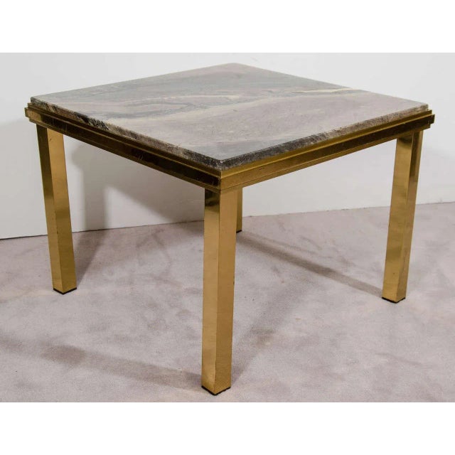 A substantial Italian '70s modern brass and marble end table, in the style of Italian designer Willy Rizzo, circa 1970s,...