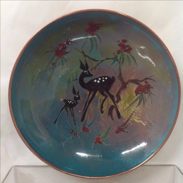 Mid Century enameled copper charger with a deer and fawn. Signed. Hand painted made in Holland.