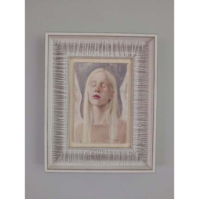 This oil painting on aluminum panel features a serene figure with closed eyes, exuding a sense of tranquility and...