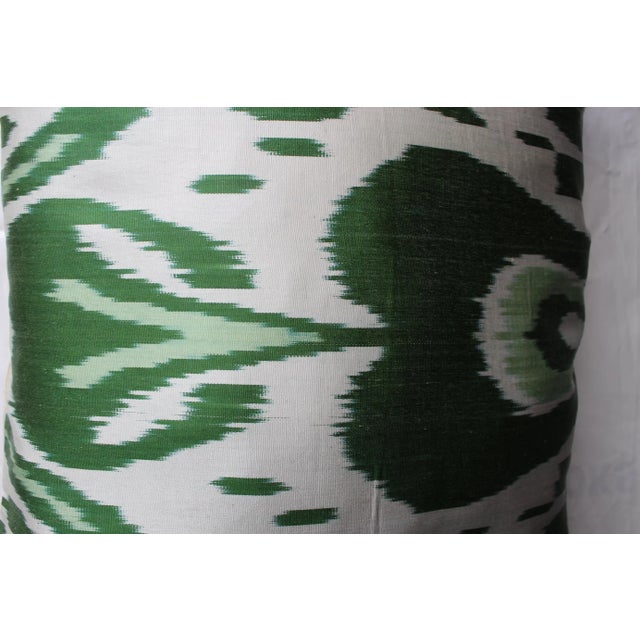 This luxurious pillow is handmade using silk ikat. Our ikats are handwoven by highly skilled artisan weavers in Turkey...