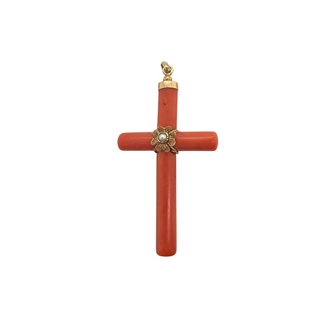 This Victorian coral cross pendant features rich natural coral accented with 18K gold mounts and a central seed pearl set...
