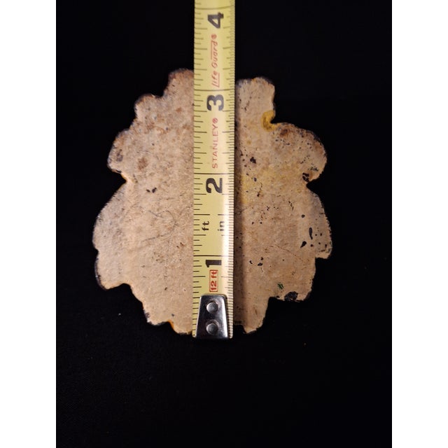 For sale is an antique cast iron architectural door knocker believed to be attributed to the Hubley Manufacturing Company...