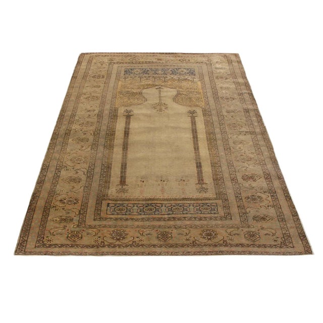 Hand knotted in high-quality wool originating from Turkey in 1870, this antique Kayseri rug enjoys an inviting, luminous...
