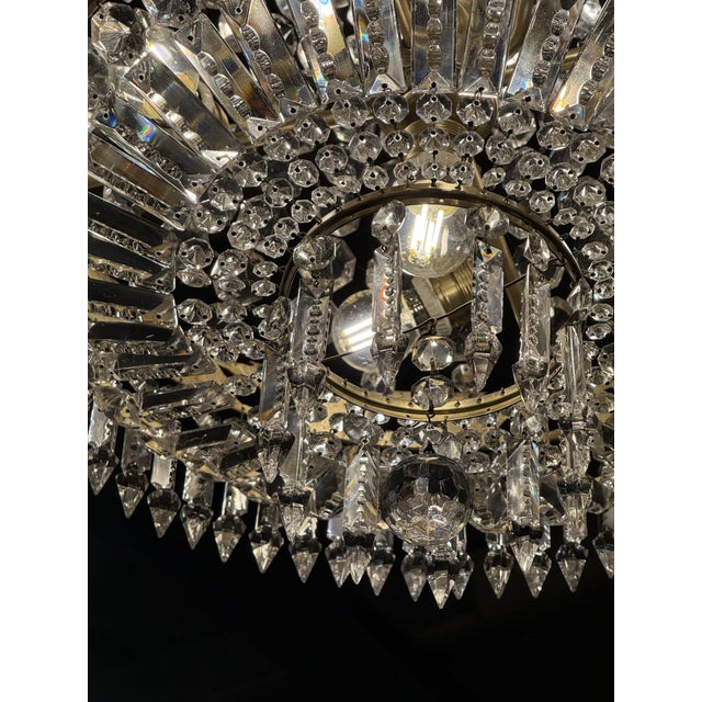 Louis XV Eight-Light Cage Chandelier with Crystal and Gilt Bronze Pendants, 1890s, in Flawless conditions. Designed before...